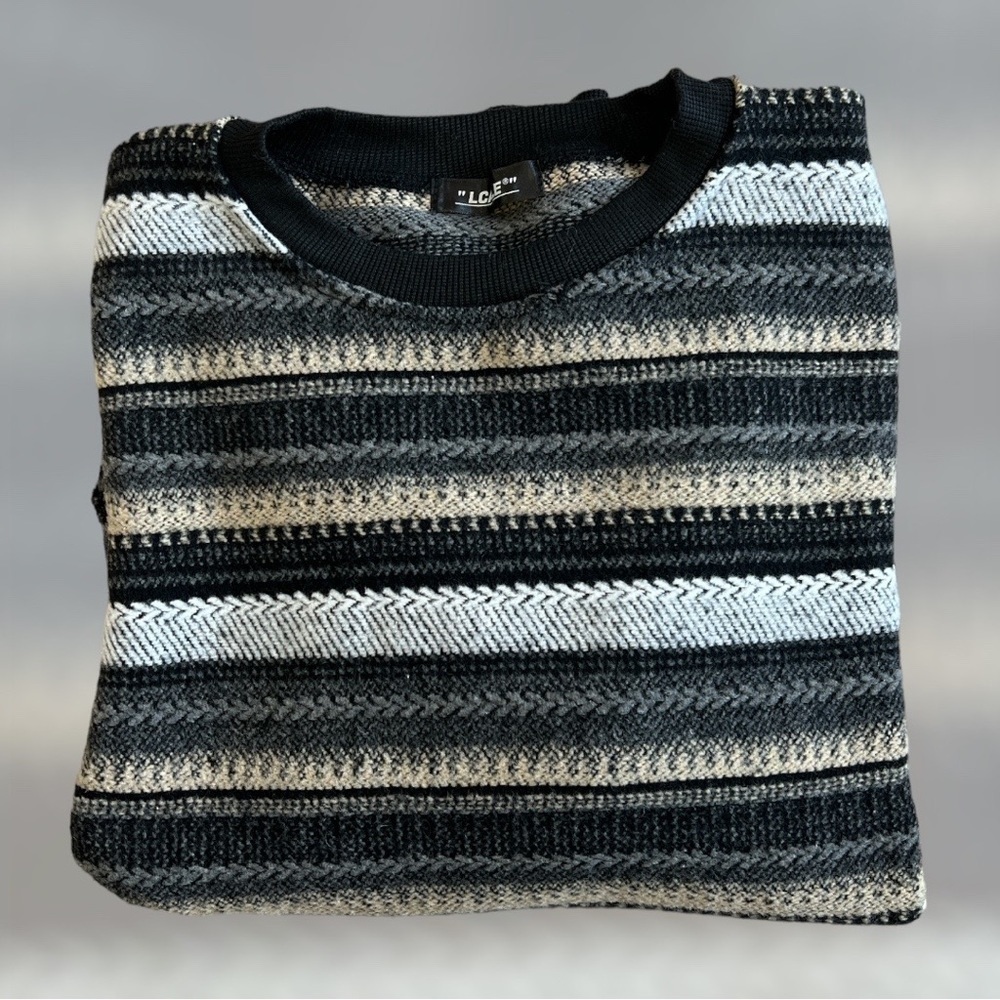 Neutral colored striped one pocket sweater